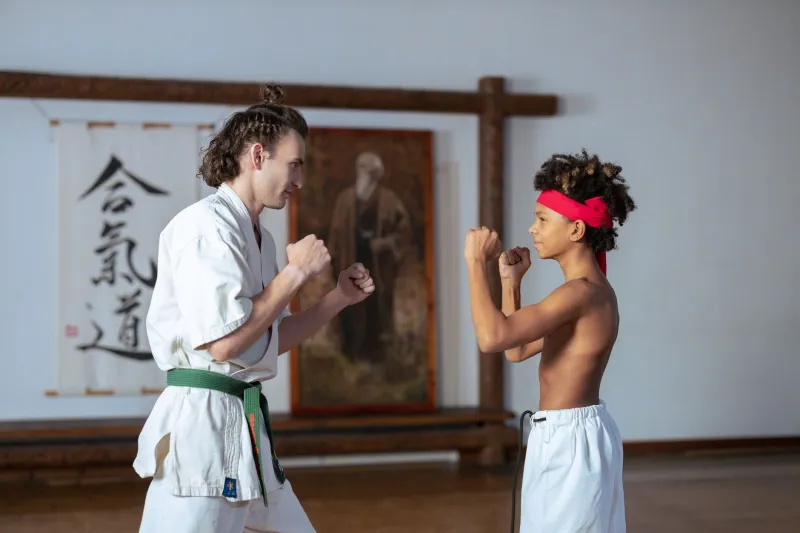 Time on the Wall, Discipline in the Room: How Training Clocks Transform Your Martial Arts Space
